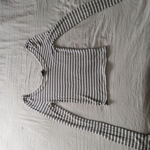 Black and white stripped shirt.
